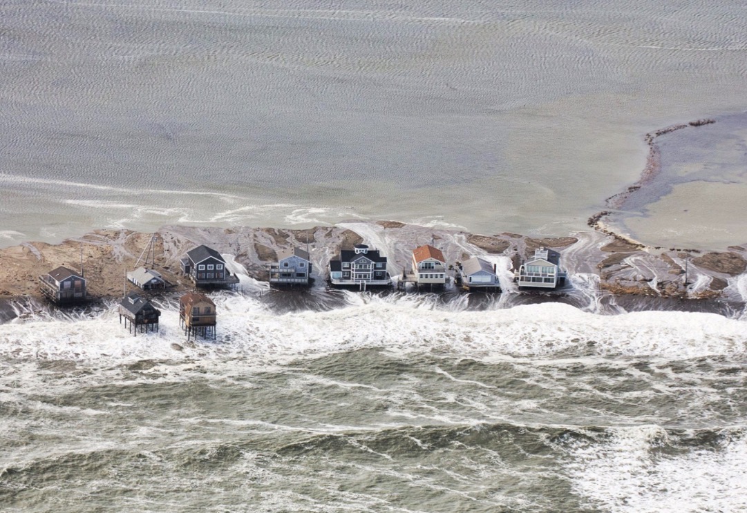 Aerial view of coastal flooding around a row of beach houses in Scituate, Massachusetts, March 4, 2018. Photo: Karl Swenson/SKYWARN Spotter